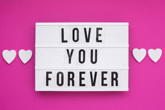 Disposizione piatta con messaggio "ti amo per sempre"