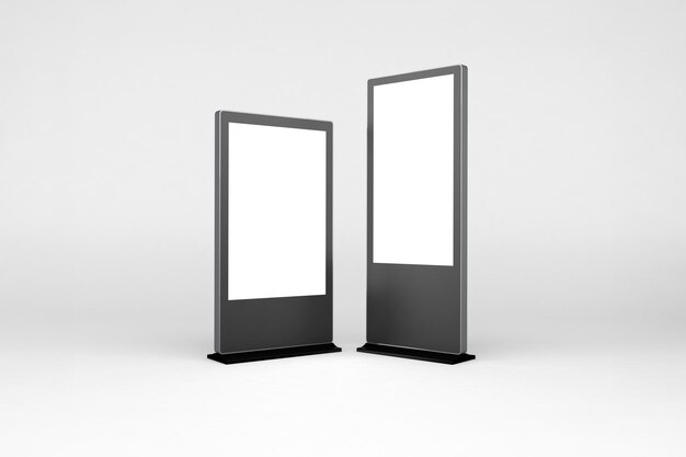 Due display pubblicitari digitali su una superficie grigio chiaro