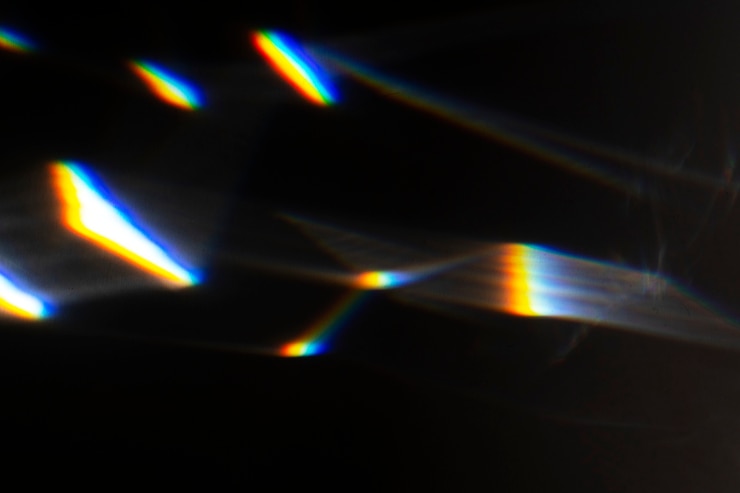 Foto gratuito effetto di perdita di luce su una carta da parati a sfondo nero