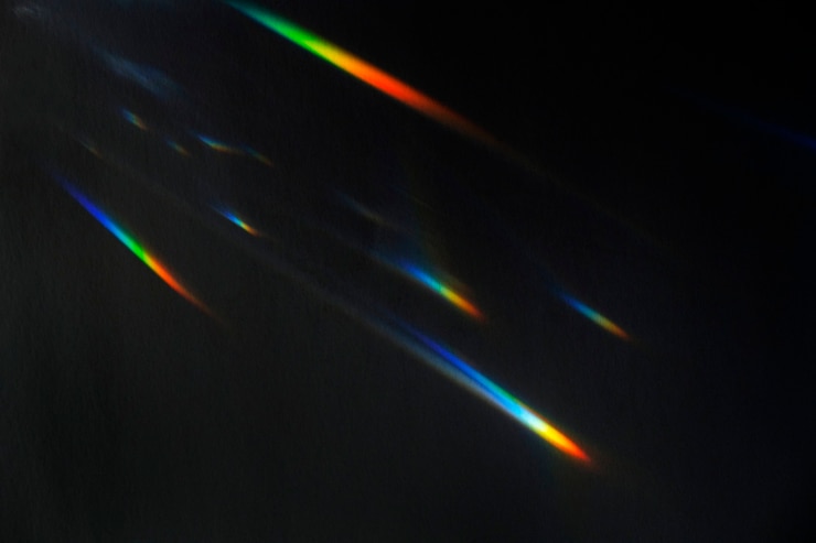 Foto gratuito effetto di perdita di luce su una carta da parati nera