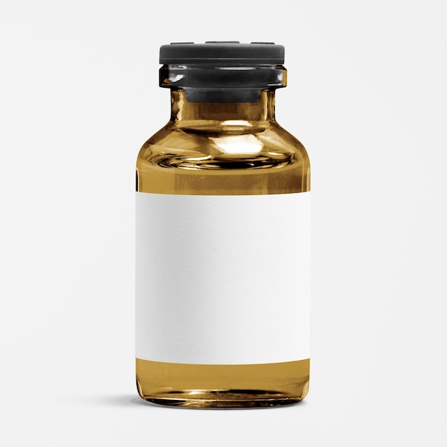 Etichetta bianca vuota sulla bottiglia di vetro della fiala di iniezione color ambra