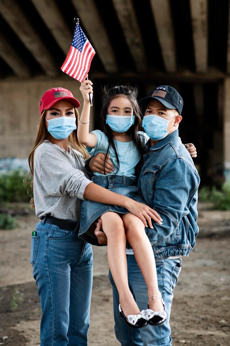 Foto gratuito famiglia di tiro medio con bandiera e maschera