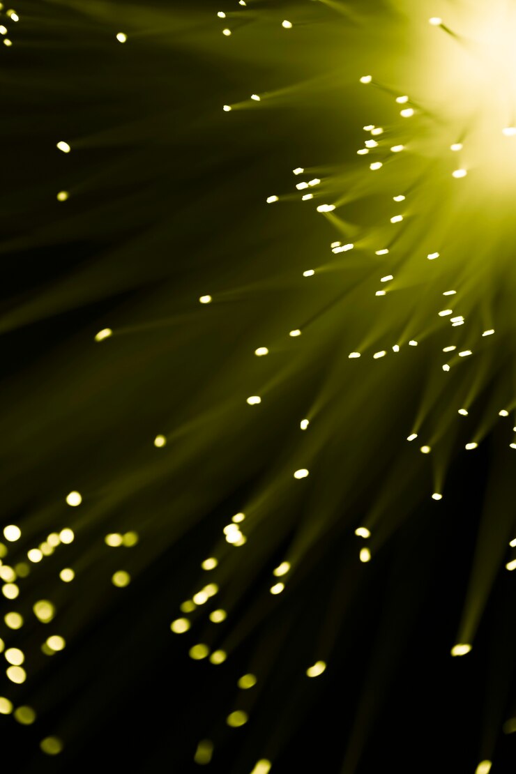Foto gratuito fibra ottica del primo piano chiara in giallo