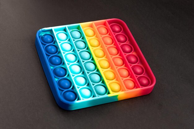 Fidget pop it toy color arcobaleno, antistress, divertente ed educativo