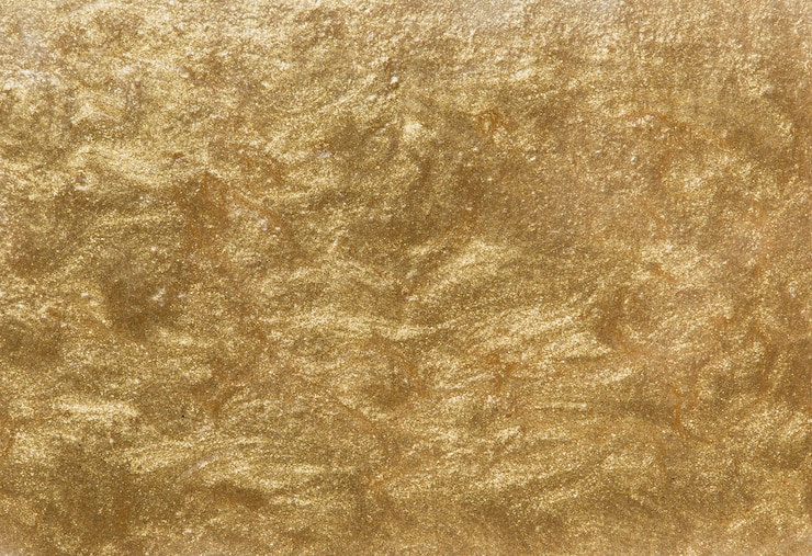 Foto gratuito fondo dorato metallico