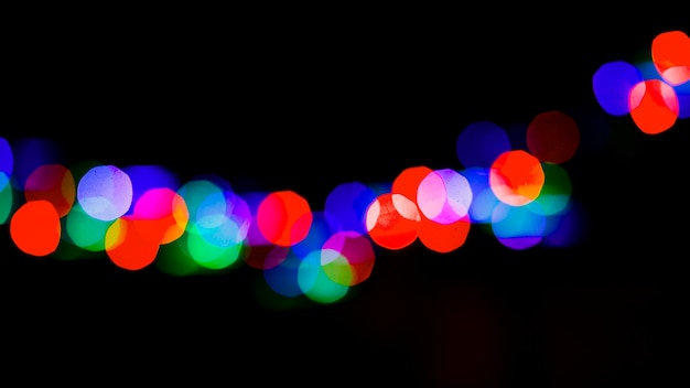 Fondo rotondo variopinto delle luci del bokeh