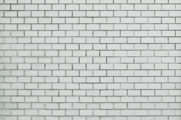 Fondo strutturato del muro di mattoni bianco