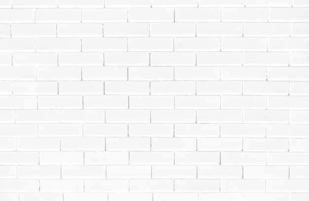 Fondo strutturato del muro di mattoni bianco