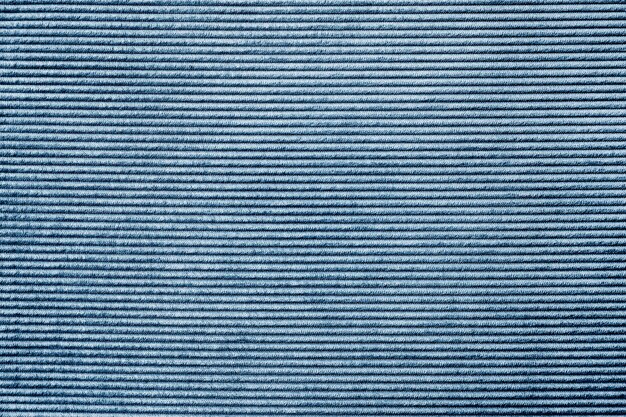 Fondo strutturato del tessuto del tappeto blu
