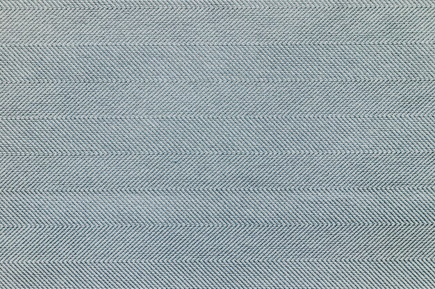 Fondo strutturato del tessuto del tappeto grigio