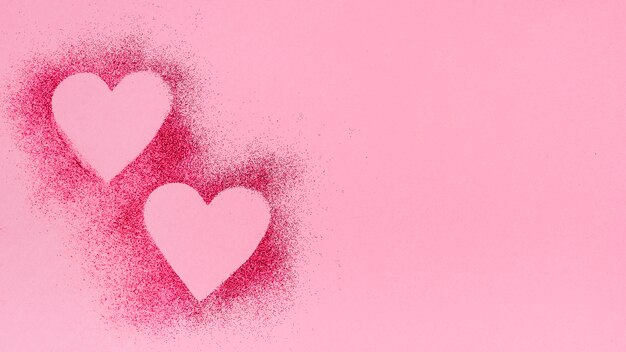 Forme di cuore in polvere glitterata