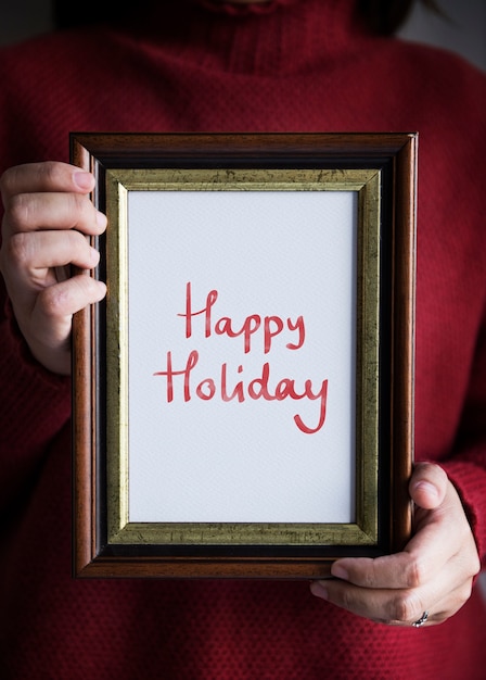 Frase Happy holiday in a frame