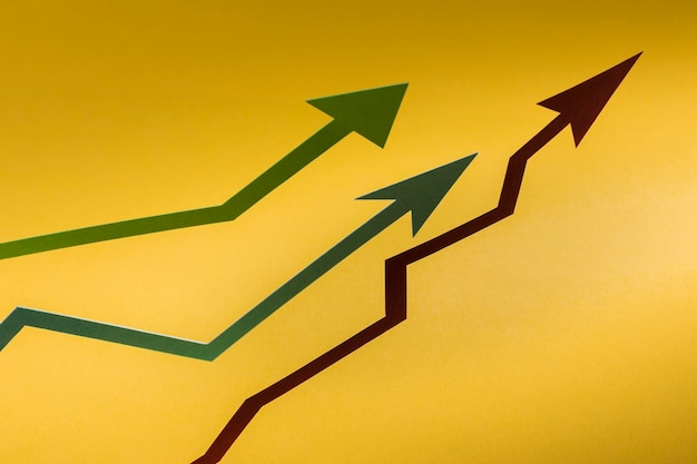 Freccia di carta piatta che indica la crescita dell'economia