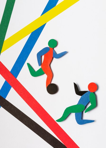 Giocatori di calcio colorati in stile carta