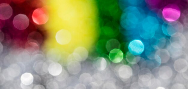 Glitter scintillanti sfocati dell'arcobaleno