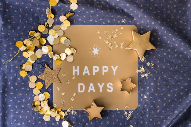 Happy Days iscrizione su carta con stelle