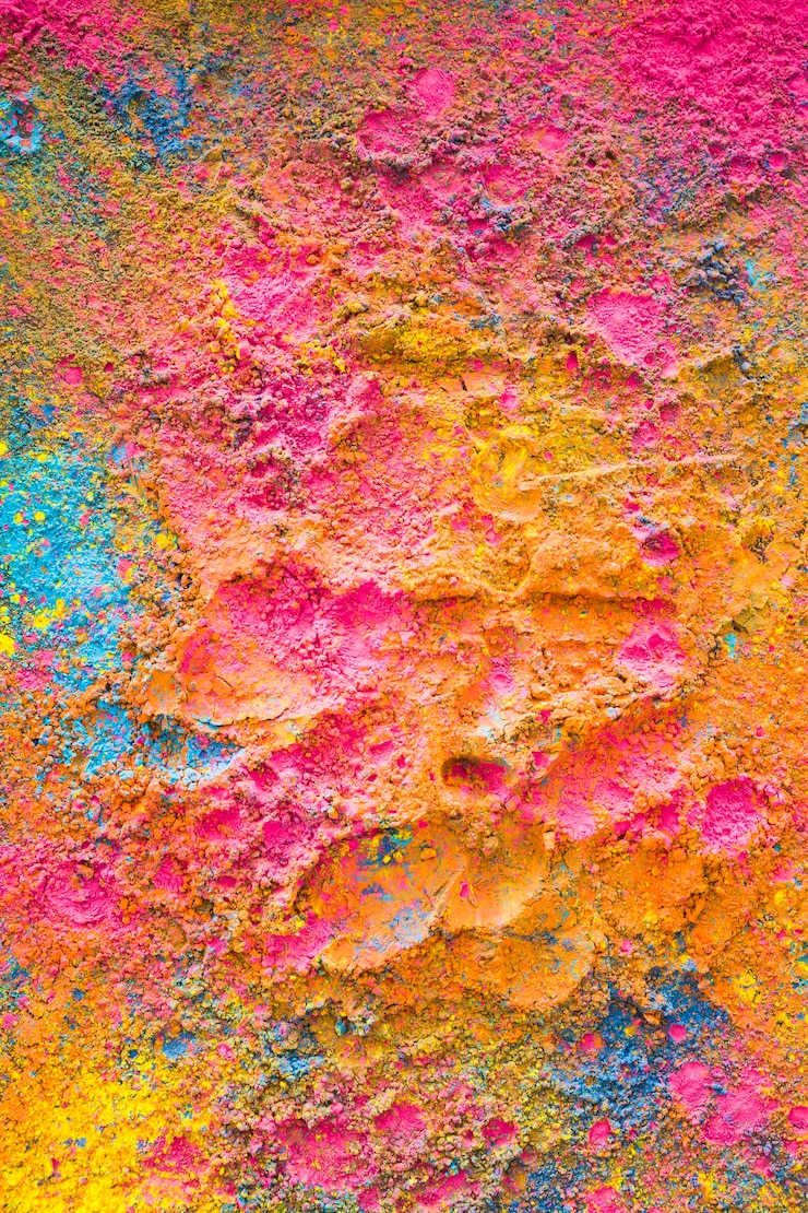 Foto gratuito i colori di holi sparsi a caso sulla superficie