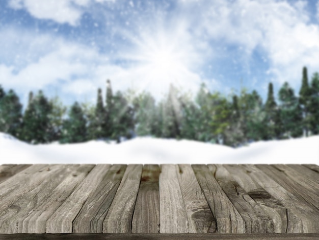 Il rendering 3D di un tavolo di legno con un paesaggio innevato di Natale in background