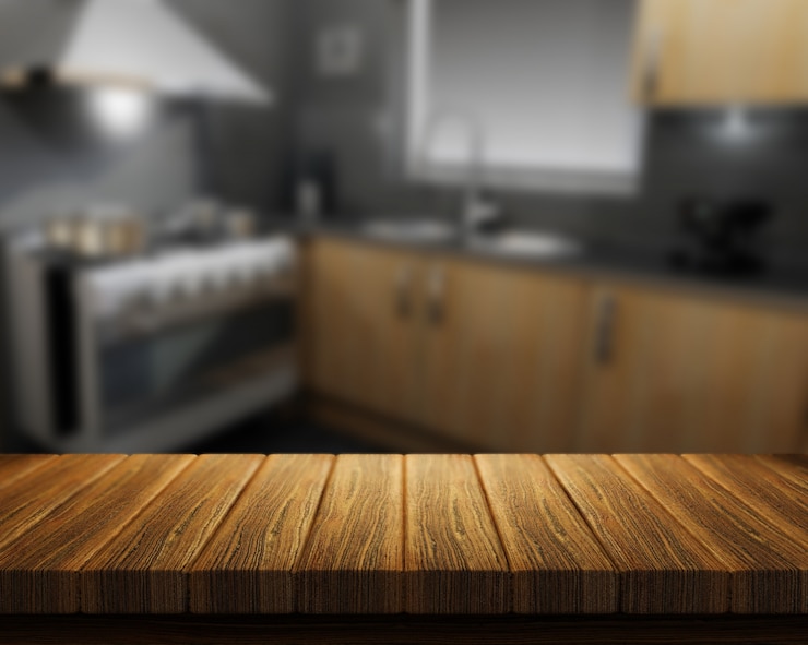 Foto gratuito il rendering 3d di un tavolo di legno con una cucina in background