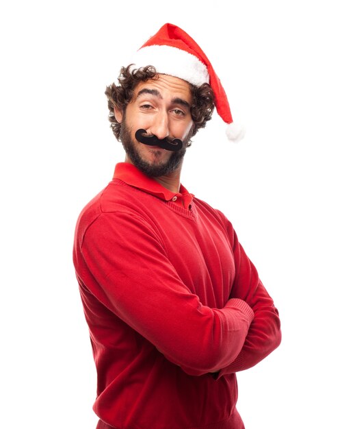 L&#39;uomo con cappello di Babbo Natale con le braccia incrociate