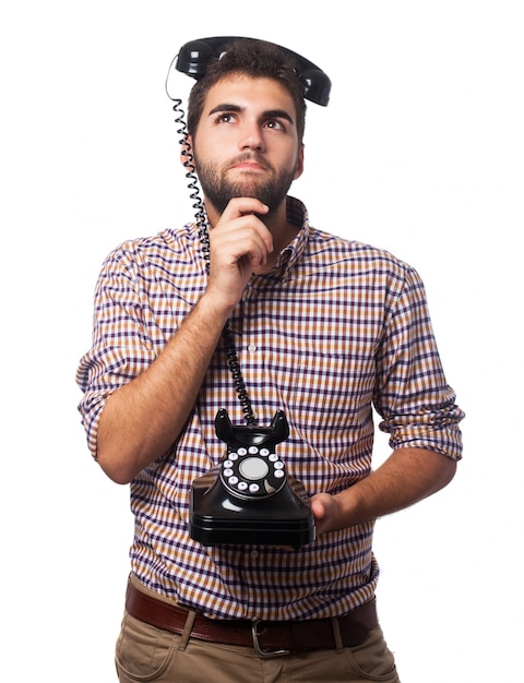 L&#39;uomo con un telefono testa