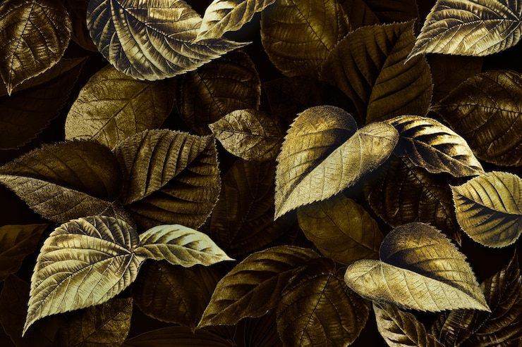 Foto gratuito la pianta dorata lascia il fondo strutturato