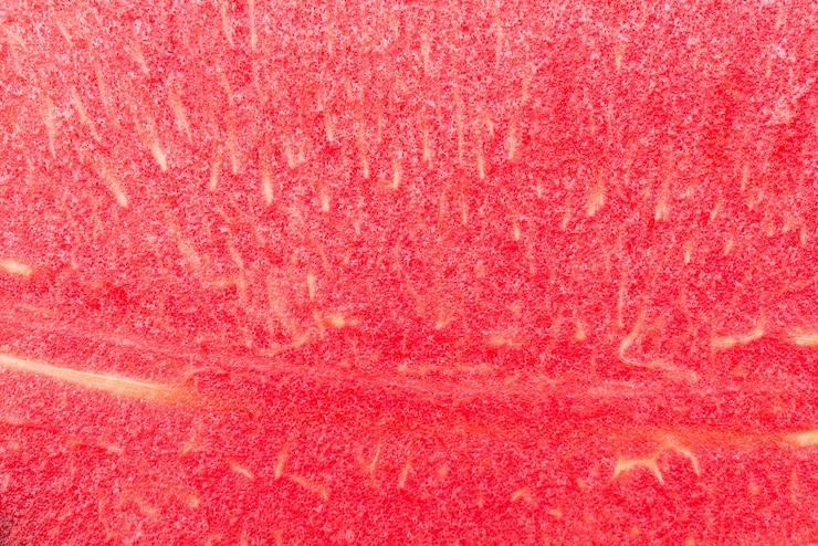 Foto gratuito lo sfondo dell'anguria da vicino