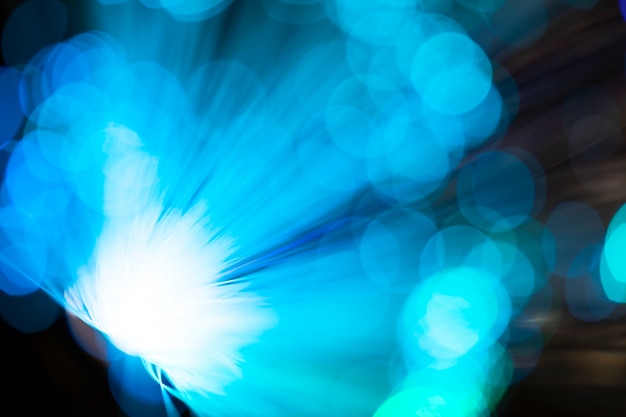 luci blu sfocate in fibra ottica