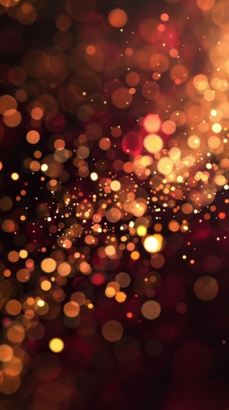 Foto gratuito luci dorate su uno sfondo scuro