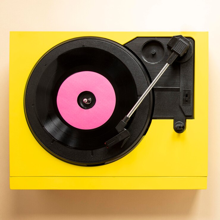 Foto gratuito macchina vinilica flat lay con disco