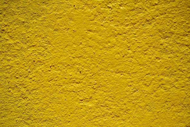 macro muro dettaglio dipinta di giallo: