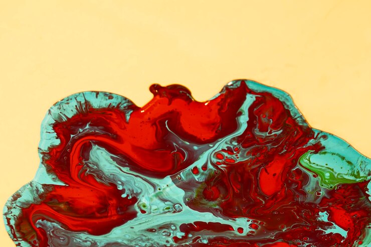 Foto gratuito miscelazione di vernice rossa e verde