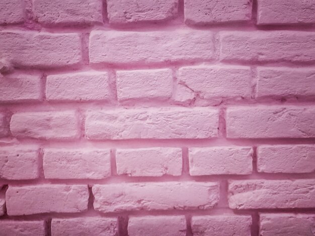 Muro di fondo di pietre rosa