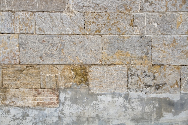 muro di mattoni cementato