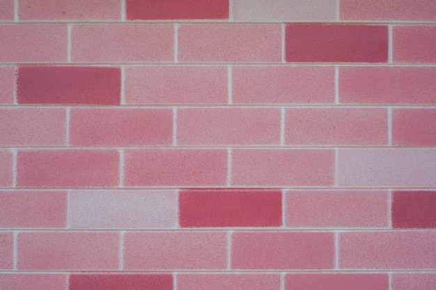 Muro di mattoni rosa per sfondo