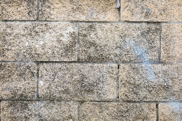 Muro di pietre con superficie ruvida