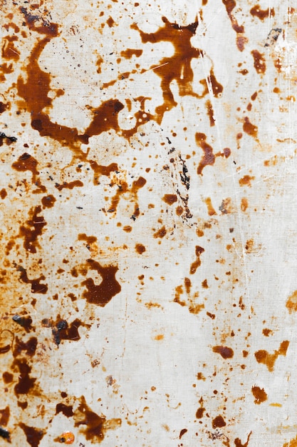 Muro di texture marrone macchiato arrugginito