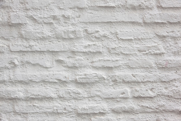 Muro grezzo di mattoni bianchi