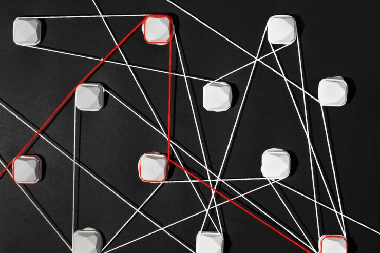 Foto gratuito natura morta di connessione a filo rosso