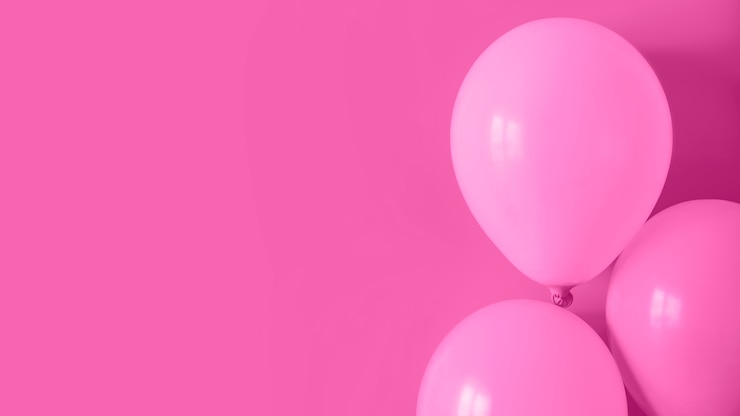 Foto gratuito palloncini rosa con spazio di copia