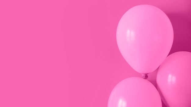 Palloncini rosa con spazio di copia