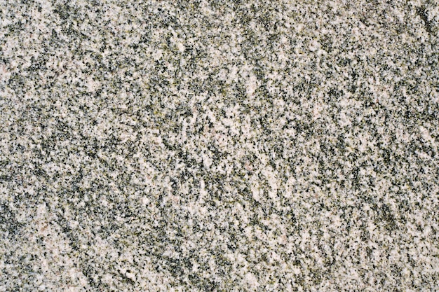 Parete in marmo, sfondo grafico grigio argento scuro e motivo verde. Muro nero chiaro elegante astratto con struttura in ceramica. Piastrelle in pietra sul pavimento, colore grigio scuro naturale delle finiture degli edifici