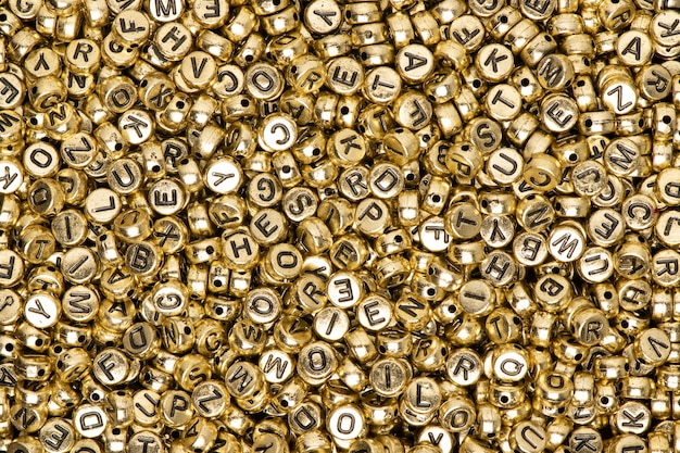 Perline alfabeto inglese oro metallizzato