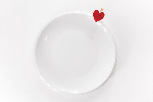 Piccolo cuore attaccato al piatto