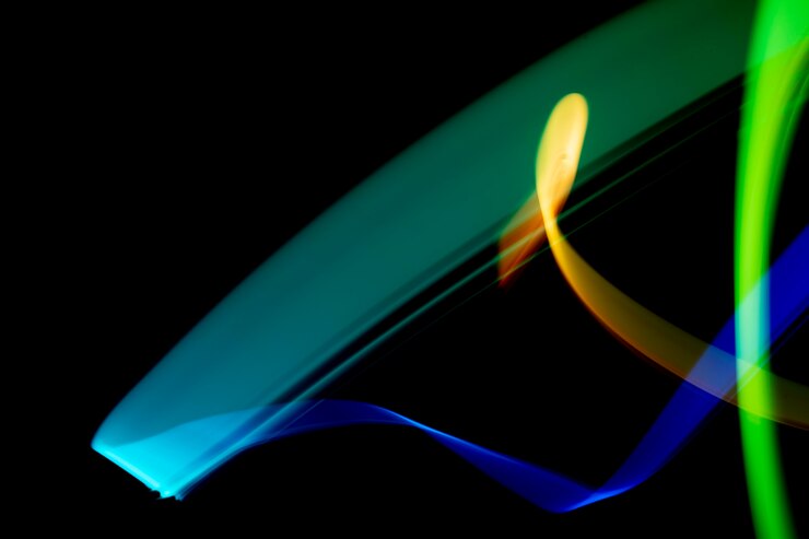 Foto gratuito pittura a luce astratta al buio