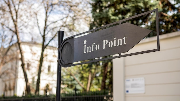 Posta di direzione con iscrizione Info Point