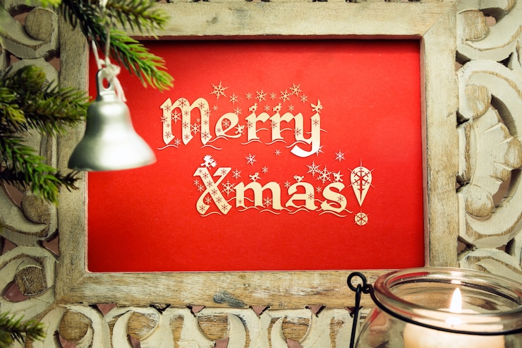 Foto gratuito poster rosso con il messaggio &quot;buon natale&quot;