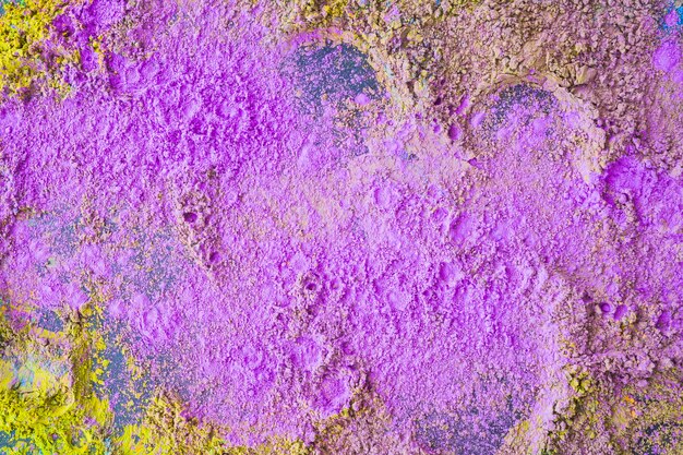 Primo piano della priorità bassa tradizionale viola di colore di holi