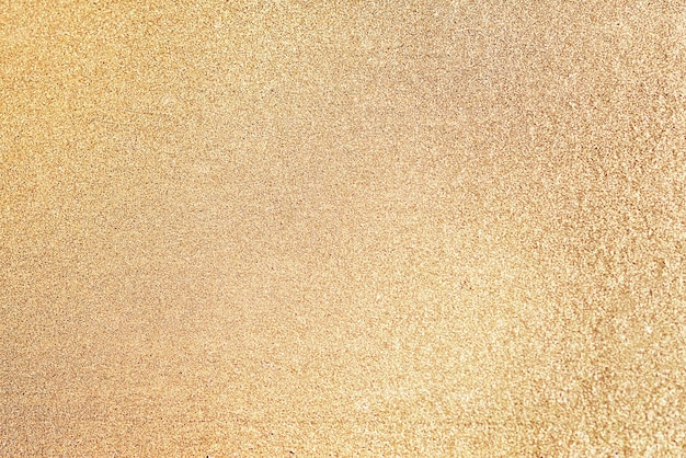 Primo piano di sfondo con texture glitter dorati