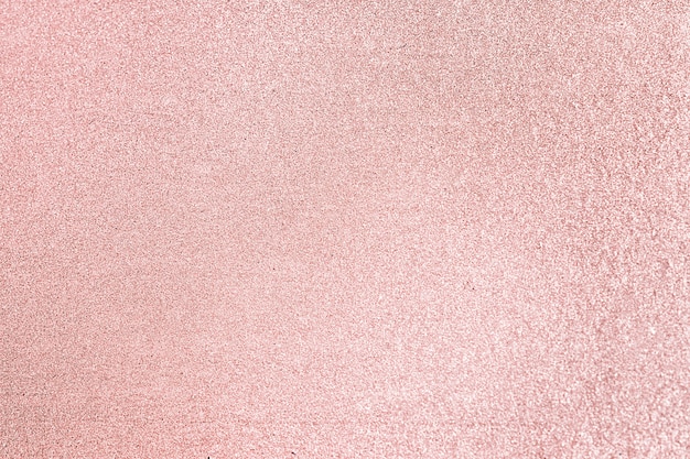 Primo piano di sfondo con texture glitter rosa fard